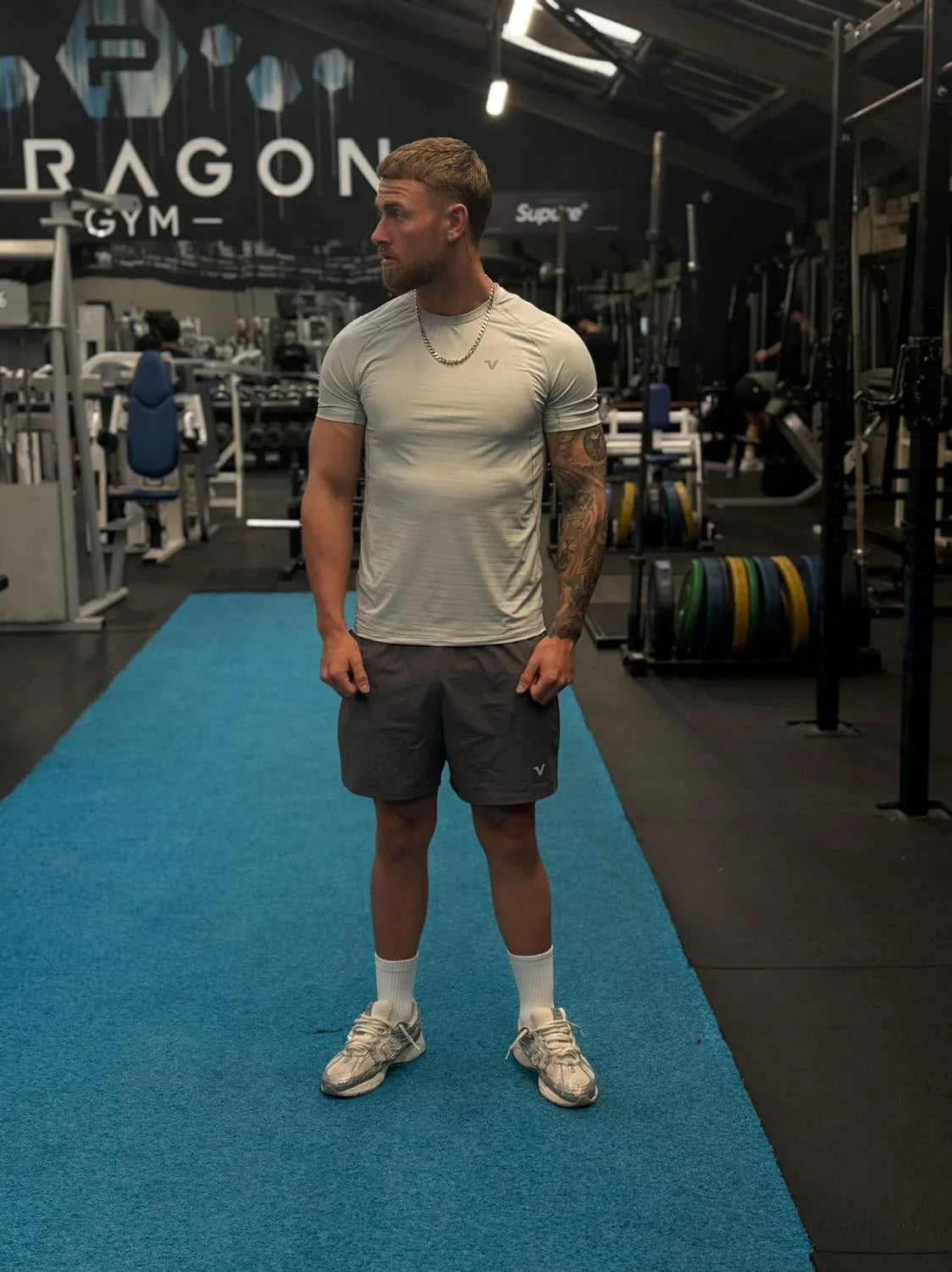 Man wearing Veritone activewear in a gym.