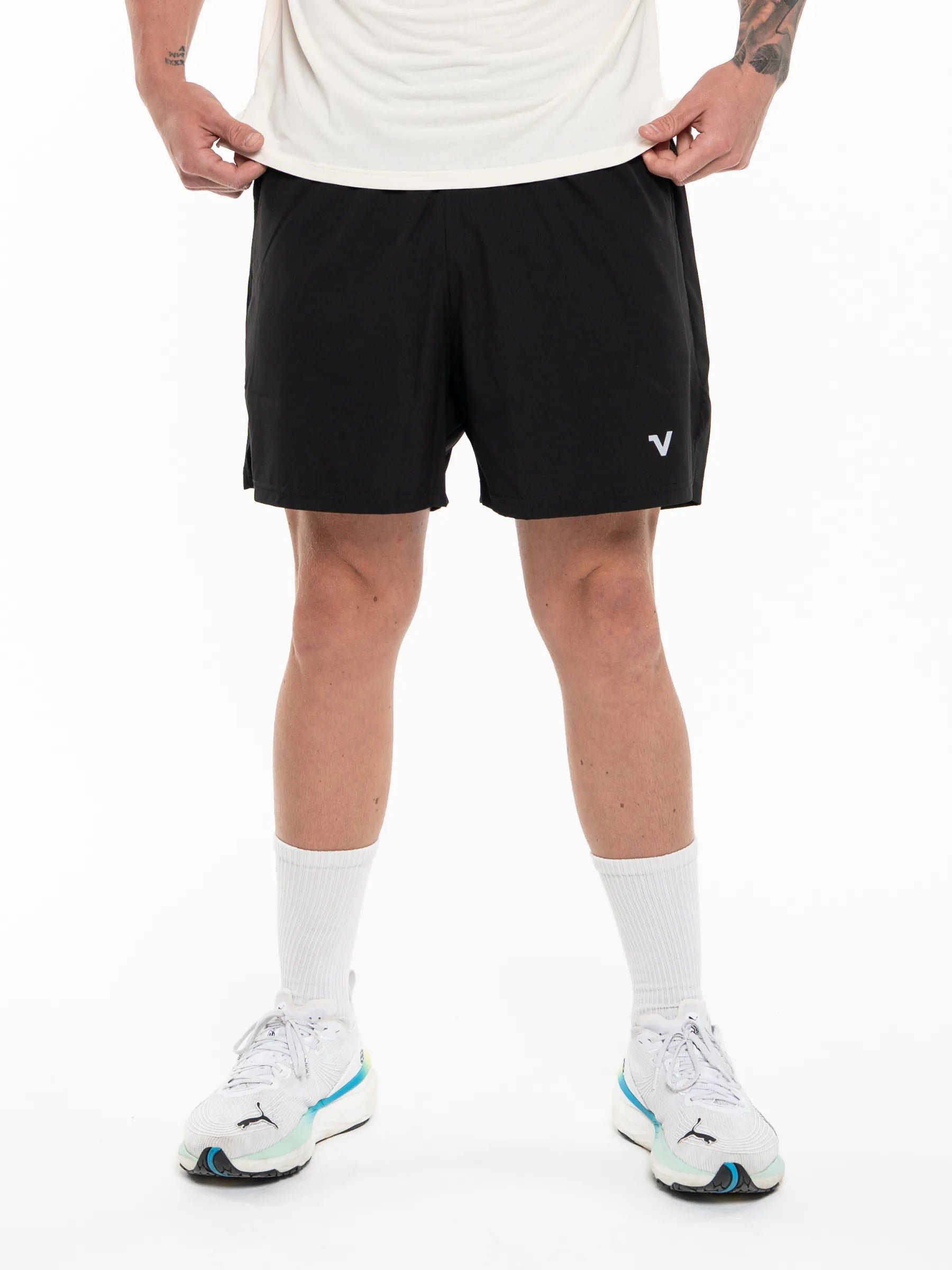 Veritone Essential Training Shorts, Black athletic shorts shown from the waist down against a white studio background.