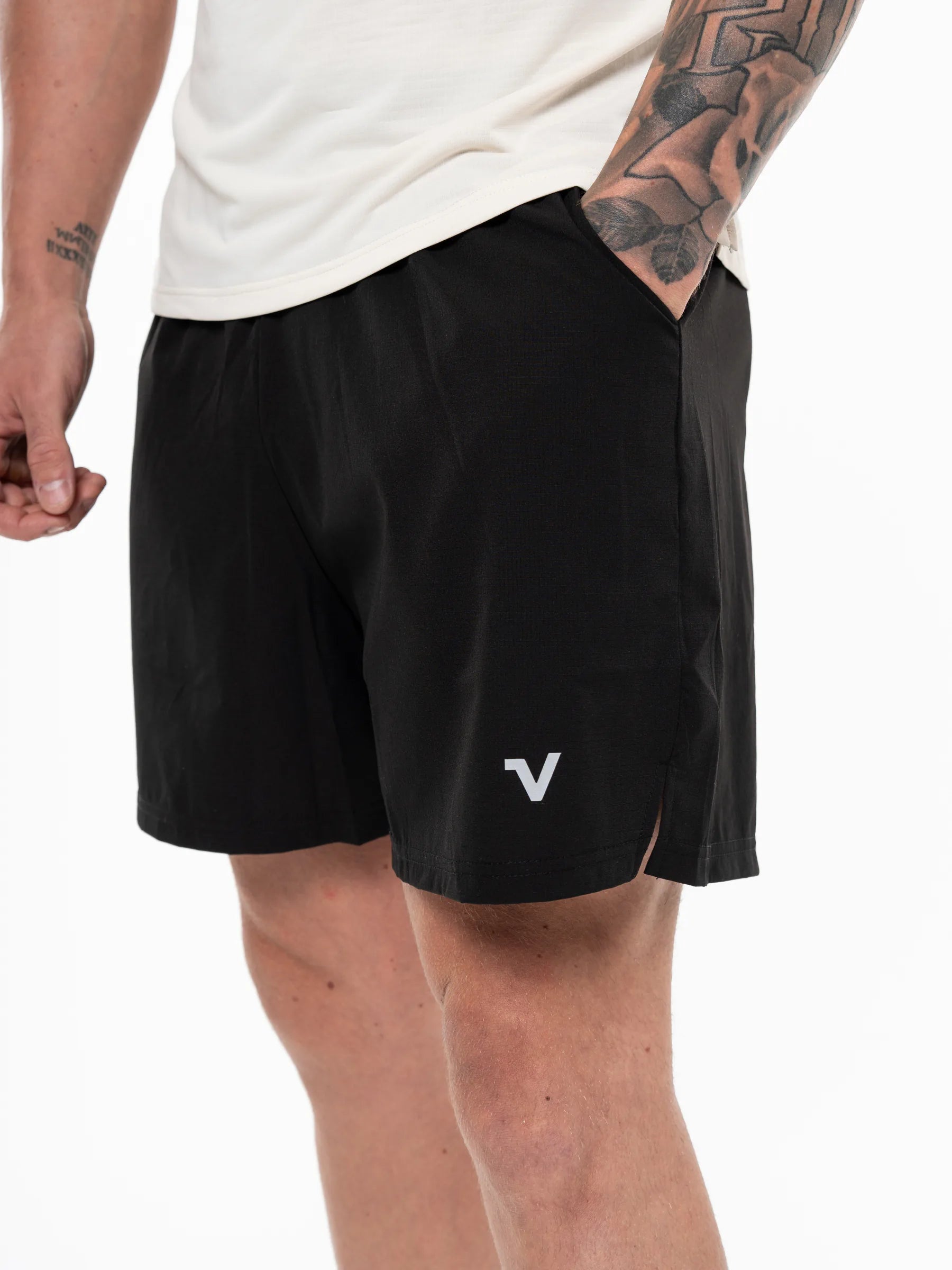 Veritone Essential Training Shorts, Black athletic shorts shown from the waist down against a white studio background.