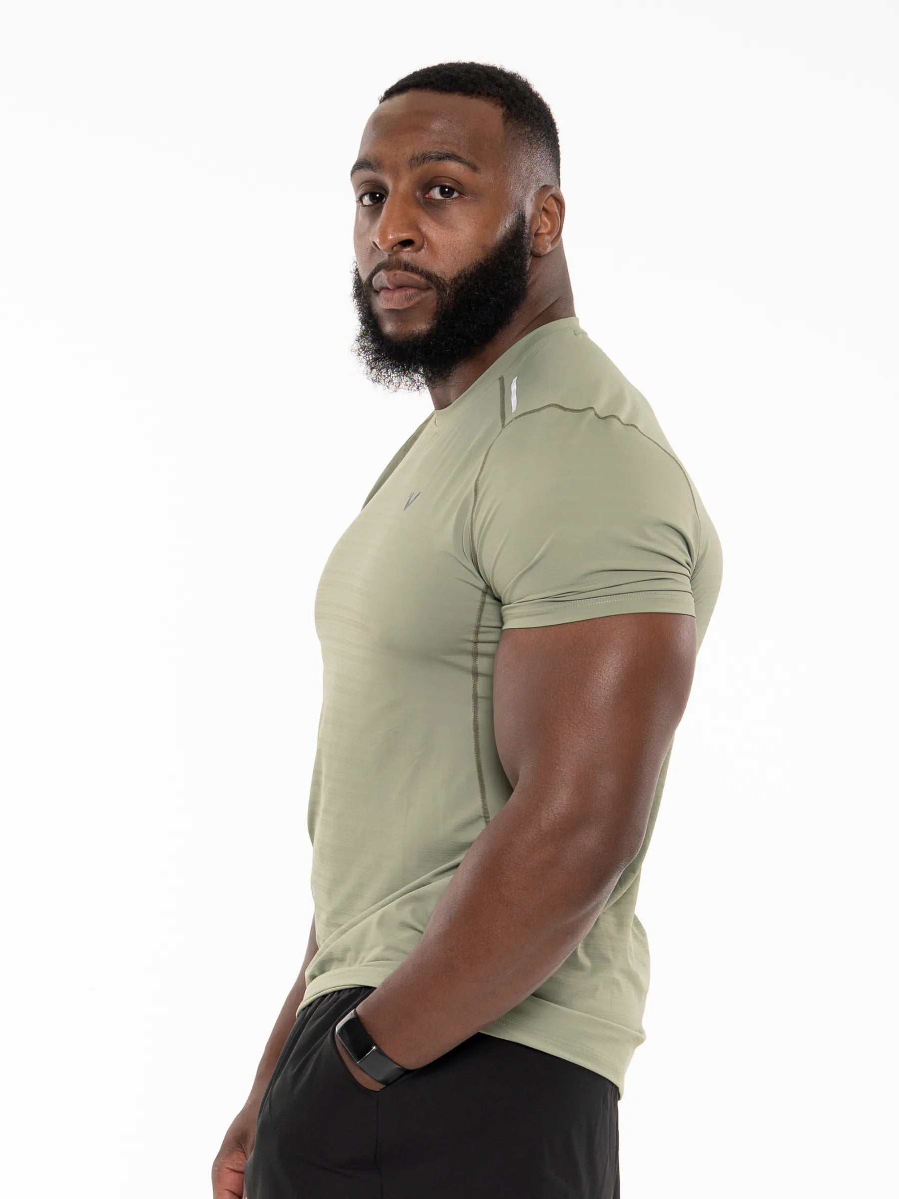 Veritone Prime Muscle Fit T-Shirt, Stone Khaki – Man wearing a green T-shirt on a white background